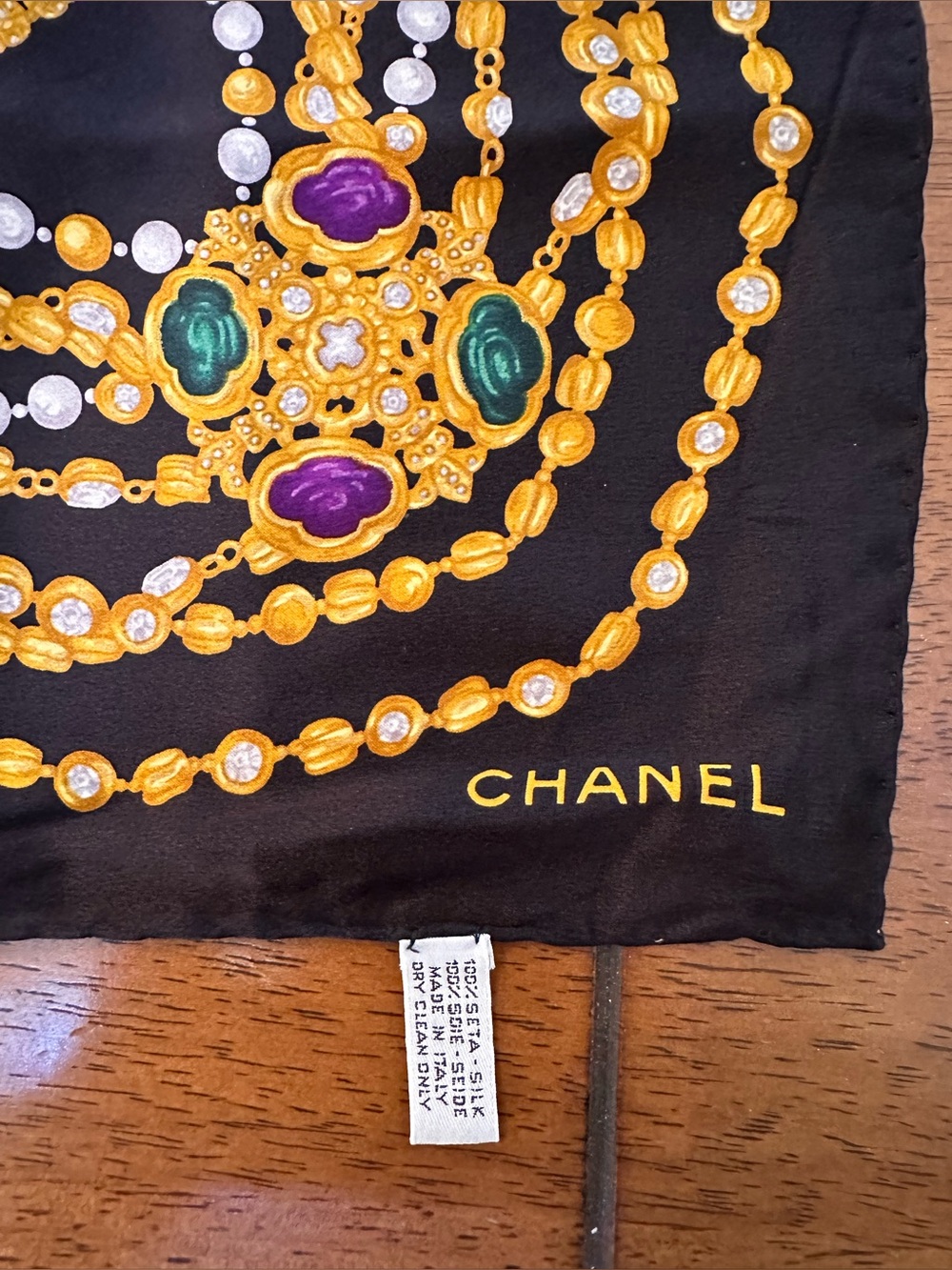 CHANEL Black Silk Scarf with Gold Chain and Jewel Motif